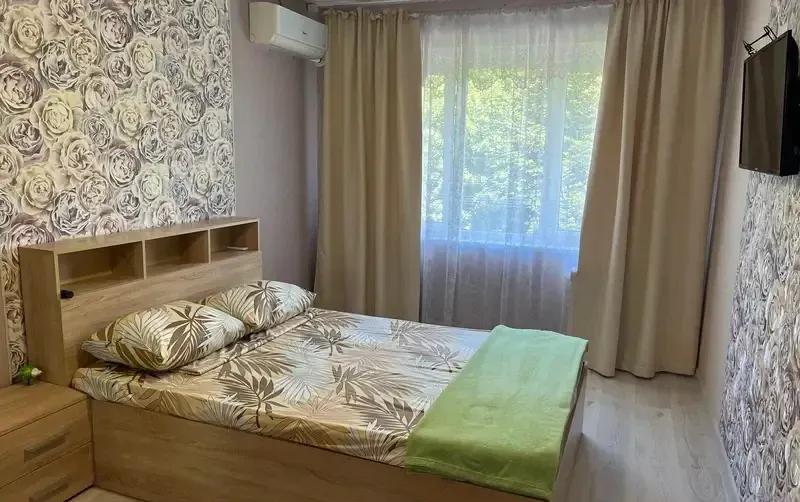 Комната в двухкомнатной квартире в центре